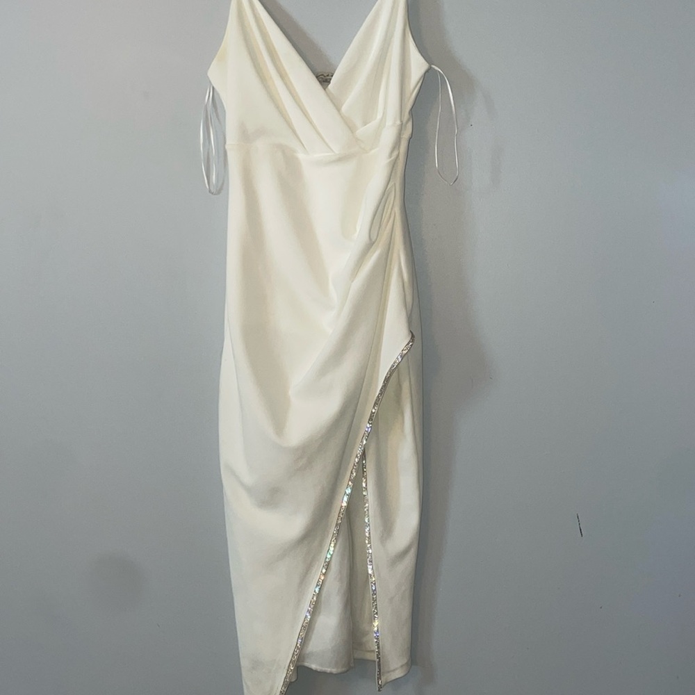 Lovely Day ivory dress with jewels at the bottom.